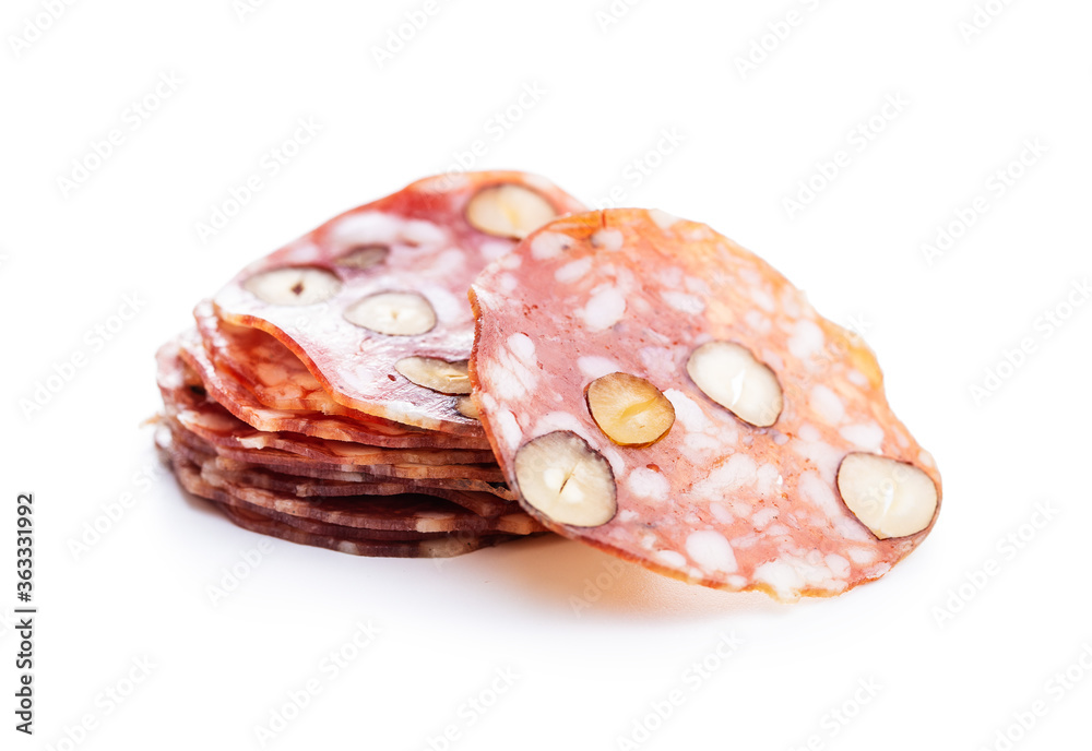 Sliced italian salami with hazelnuts. Sliced italian salami with hazelnuts.