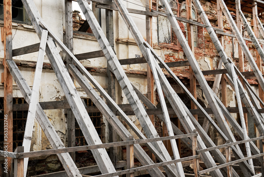 Scaffolding Covering an old building under restoration Scaffolding Covering an old building under restoration