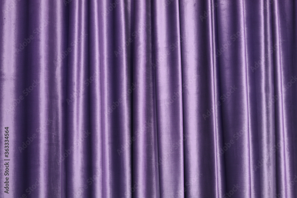 Velour purple background. Draped fabric in pleats Velour purple background. Draped fabric in pleats