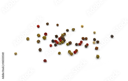 Spice of multicolored pepper isolated on white background.