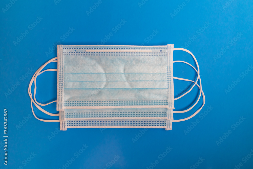 Corona virus or Covid-19 protective Medical mask, disposable surgical medical protective face mask covers the mouth and nose. Healthcare and Medical Concept white background.
Corona virus or Covid-19 protective Medical mask, disposable surgical medical protective face mask covers the mouth and nose. Healthcare and Medical Concept white background.