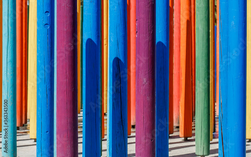 beautiful multicolored rainbow pillars made of wood