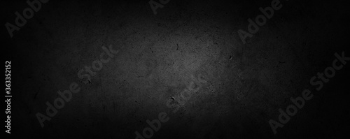 Black dark grunge textured concrete background