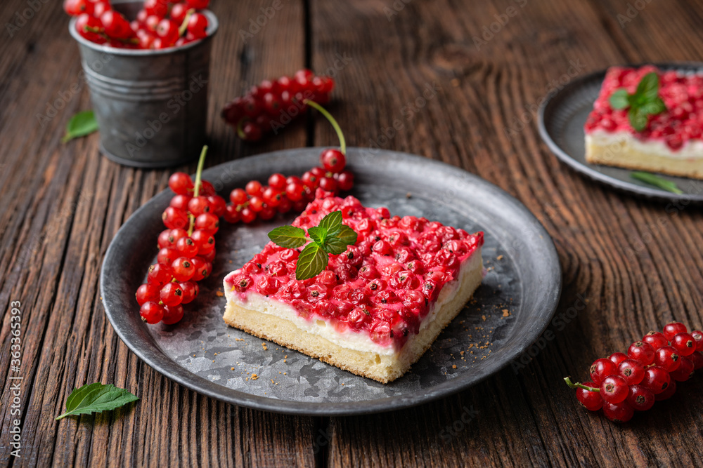 Sweet red currant dessert filled with cream cheese, decorated with fresh berries Sweet red currant dessert filled with cream cheese, decorated with fresh berries