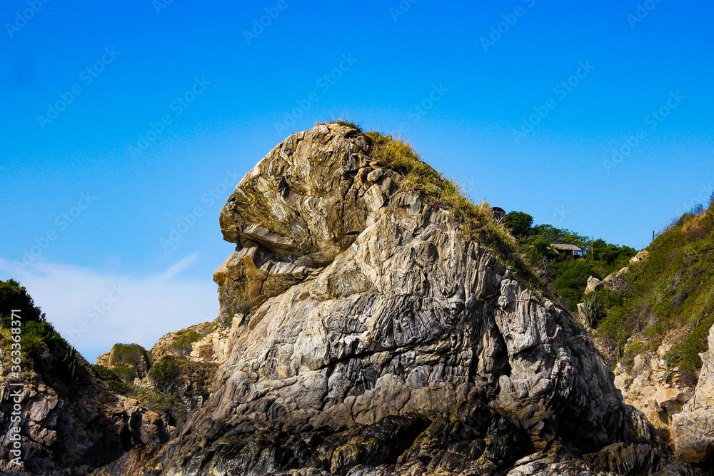 Gorilla-shaped rock, in the state of Oaxaca in Mexico, there is a rock formation that is a tourist destination because it is shaped like an ape.