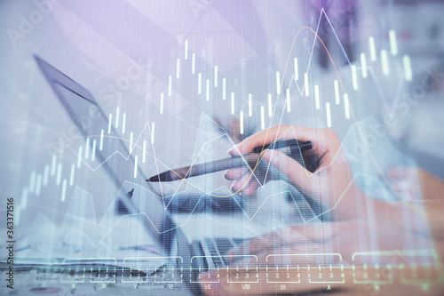 Wallpaper Mural Multi exposure of woman hands typing on computer and financial graph hologram drawing. Stock market analysis concept. Torontodigital.ca