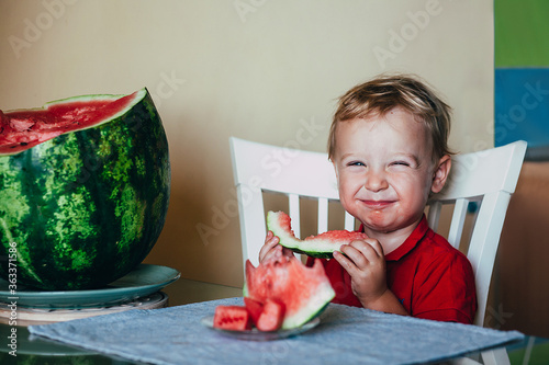 hilarious funny child eats watermelon, live style, selective focus