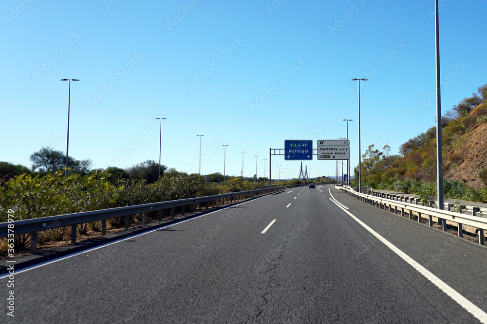 Fototapeta premium sign on freeway showing the direction to Portugal 