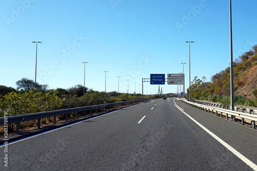 sign on freeway showing the direction to Portugal  © mikesch112