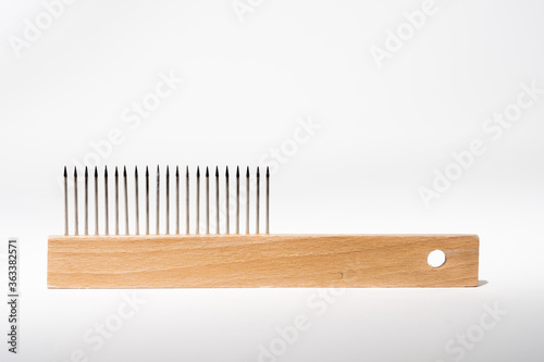 Paintbrush comb isolated ona white background with room for copy at the top