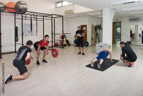 Group of Athletes Doing Fitness