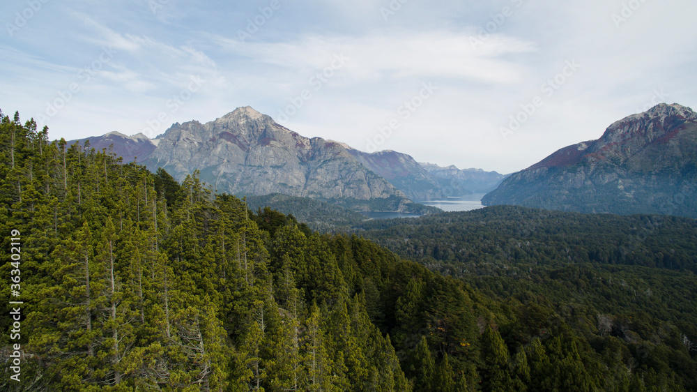Woodlands. Aerial view of the forest, lakes and mountain with a rocky peak.
Woodlands. Aerial view of the forest, lakes and mountain with a rocky peak.