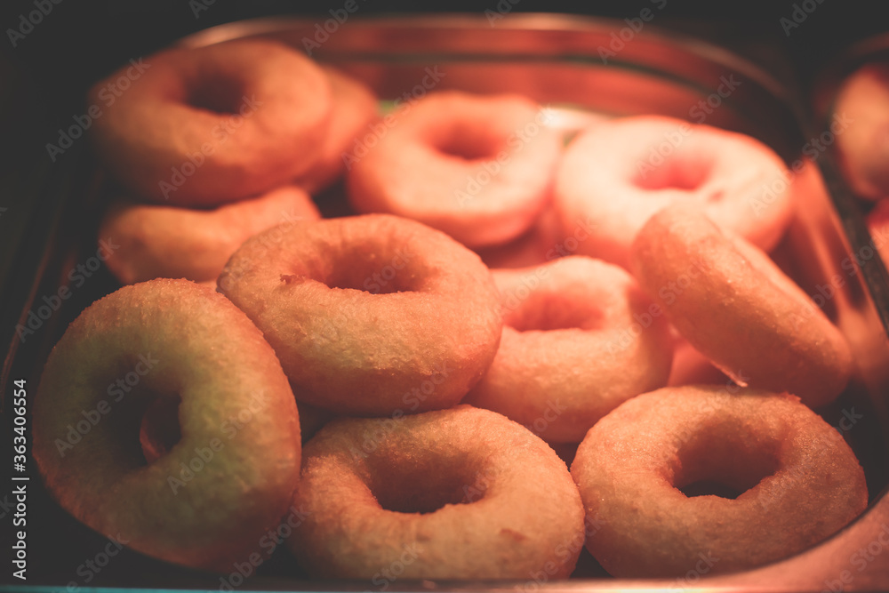 Traditional deep fried russian donuts with white powder in Saint-Petersburg, russian ponchik, pyshka, donut Traditional deep fried russian donuts with white powder in Saint-Petersburg, russian ponchik, pyshka, donut