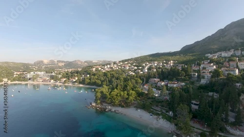 Aerial Drone Footage of the Crystal Blue Water of Mlini Beach, Croatia.