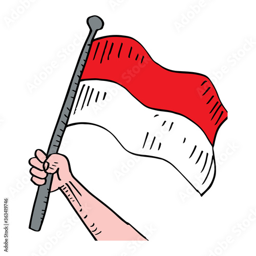 Hand hold indonesian flag 