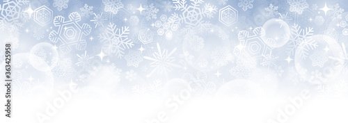 【冬・クリスマス素材】横長のキラキラした雪の結晶のベクター背景画像 青