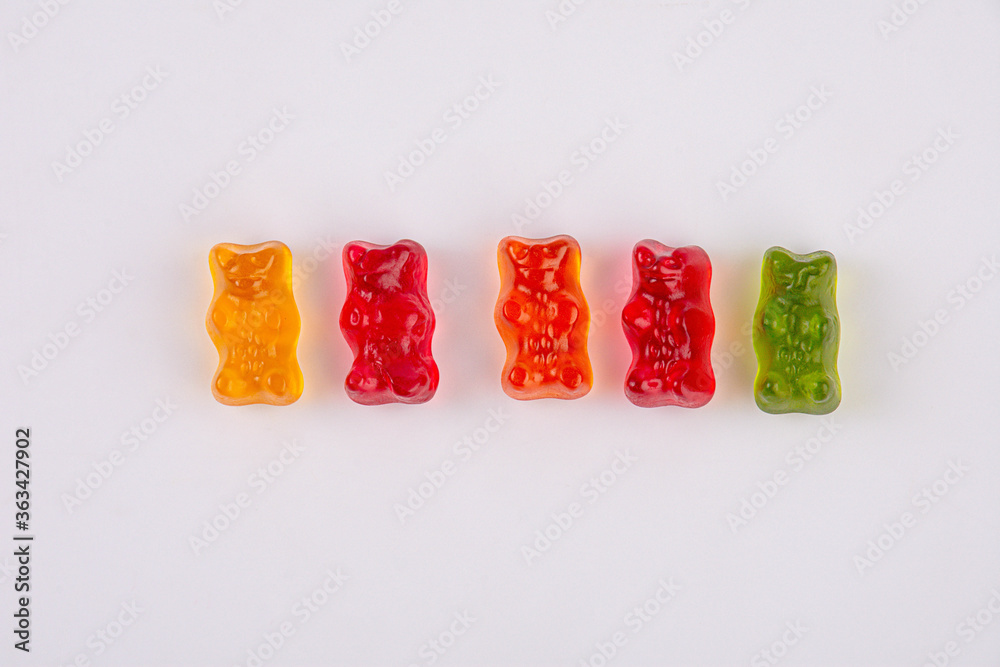 Five jelly bears isolated on white background