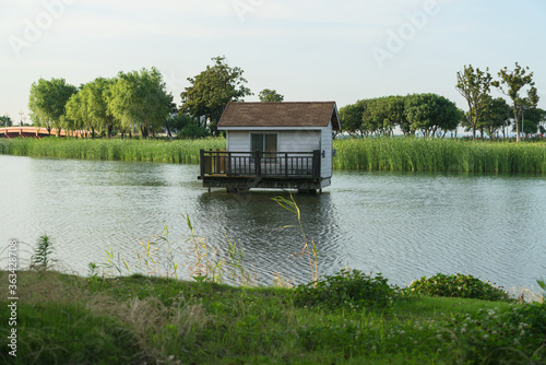 The cottage over the lake in the public park.
