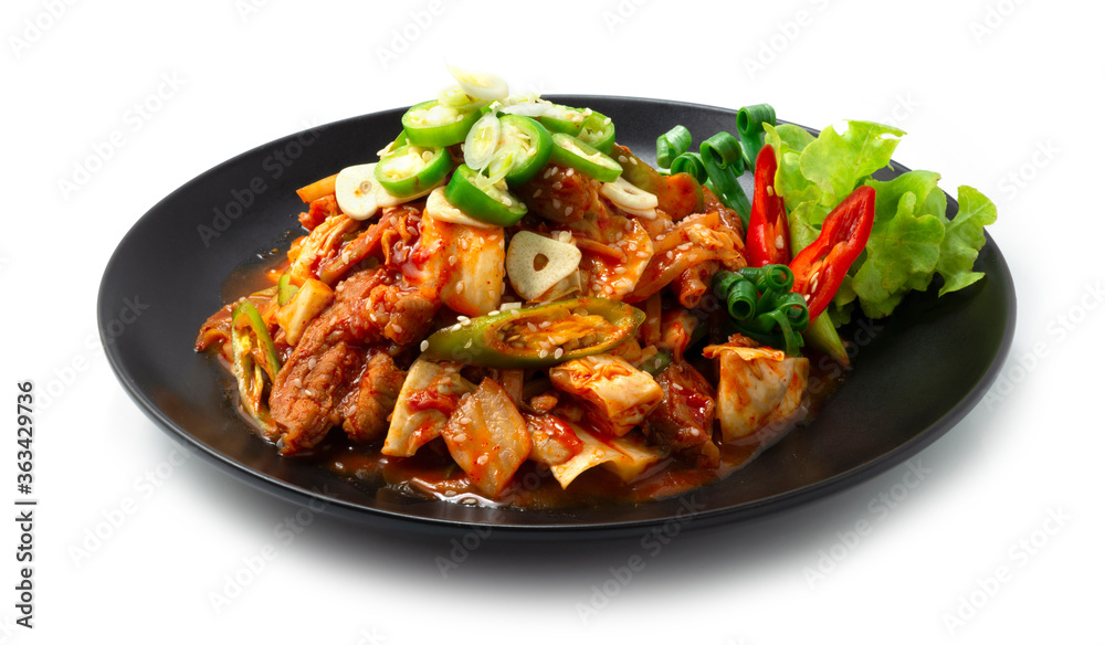 Spicy Kimchi stir fried with Pork (Dwaejigogi Kimchi Bokkeum) ontop Chili and garlic Korean Food