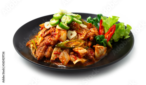Spicy Kimchi stir fried with Pork (Dwaejigogi Kimchi Bokkeum) ontop Chili and garlic Korean Food