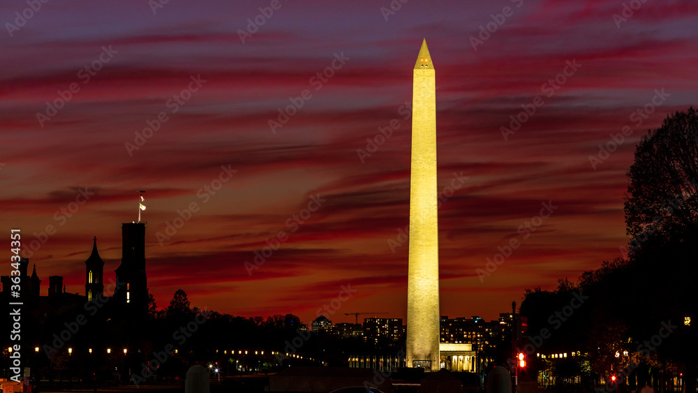 Washington Monument with red cloud  