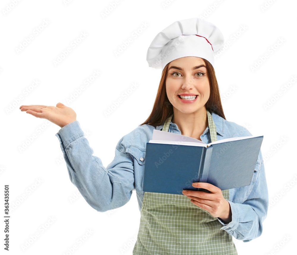 Young woman with recipe book on white background Young woman with recipe book on white background