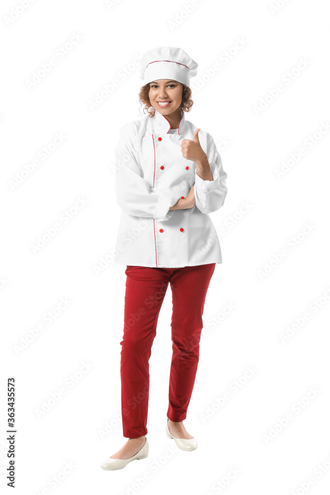Female African-American chef showing thumb-up on white background Female African-American chef showing thumb-up on white background