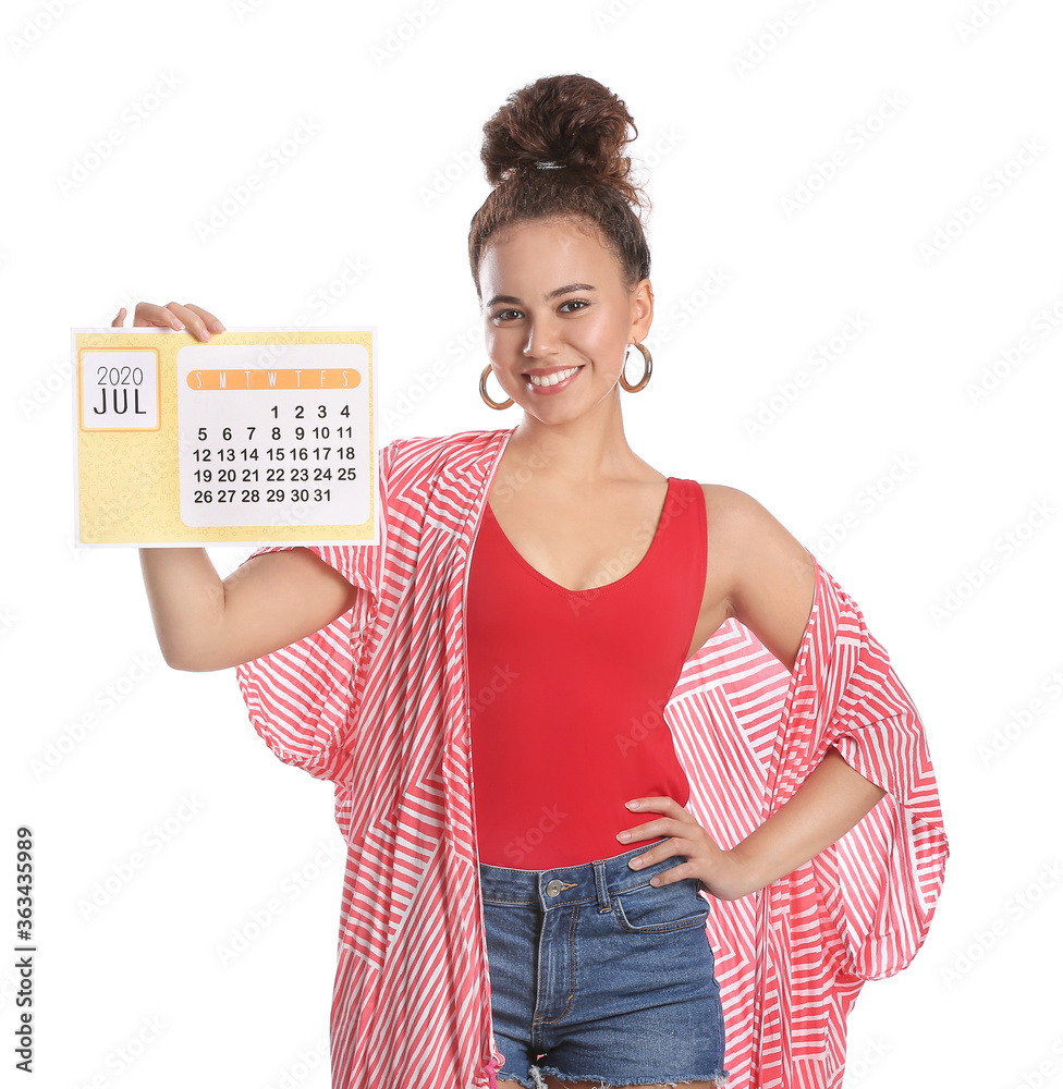 Young woman with calendar on white background. Vacation concept Young woman with calendar on white background. Vacation concept