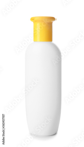 Bottle of sunscreen on white background