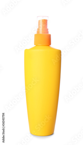 Bottle of sunscreen on white background