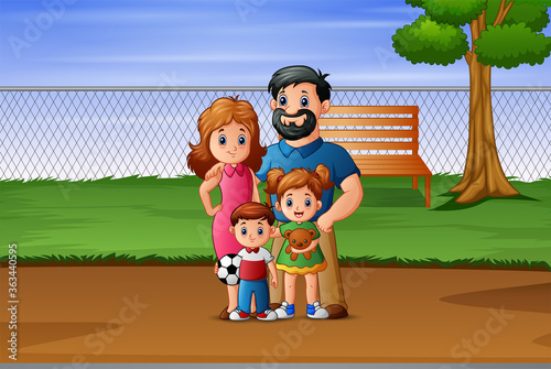 Happy family playing in the park