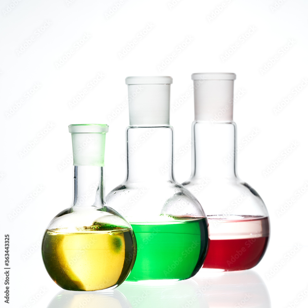Glass flask with a chemical reagent. Glass flask with a chemical reagent.