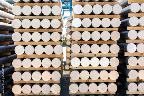 View of the aluminium billets in the factory. Aluminium is a silvery-white, soft, nonmagnetic and ductile metal in the boron group. photo
