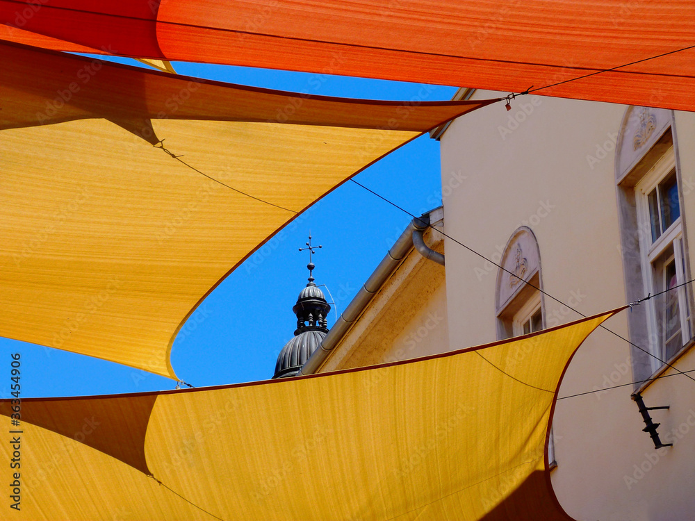 fabric sun shade patio awning. colorful street UV and sun protection