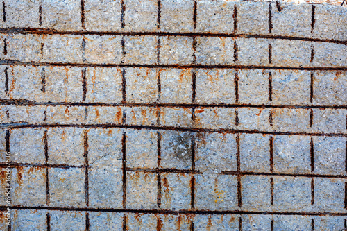 Wallpaper Mural Full frame view of the degraded concrete and rusted, exposed rebar on the wall. Concrete degradation may have various causes. Concrete can be damaged by fire, aggregate expansion, sea water effects. Torontodigital.ca