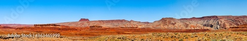 Panoramic view of the sandstone desert off Highway 261 in Utah by Gooseneck State Park. Different colored layers of dry sand show the wear of erosion. Painted desert like unity sand. Varied hues.