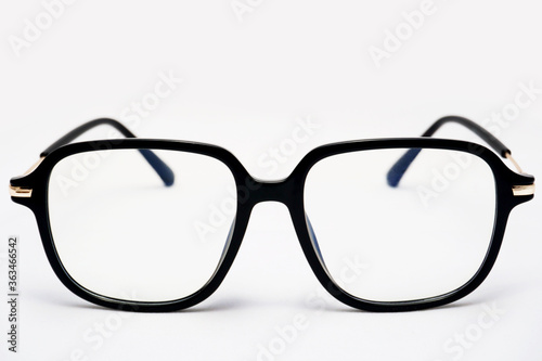 Stylish non-branded glasses with clean retouching on isolated background