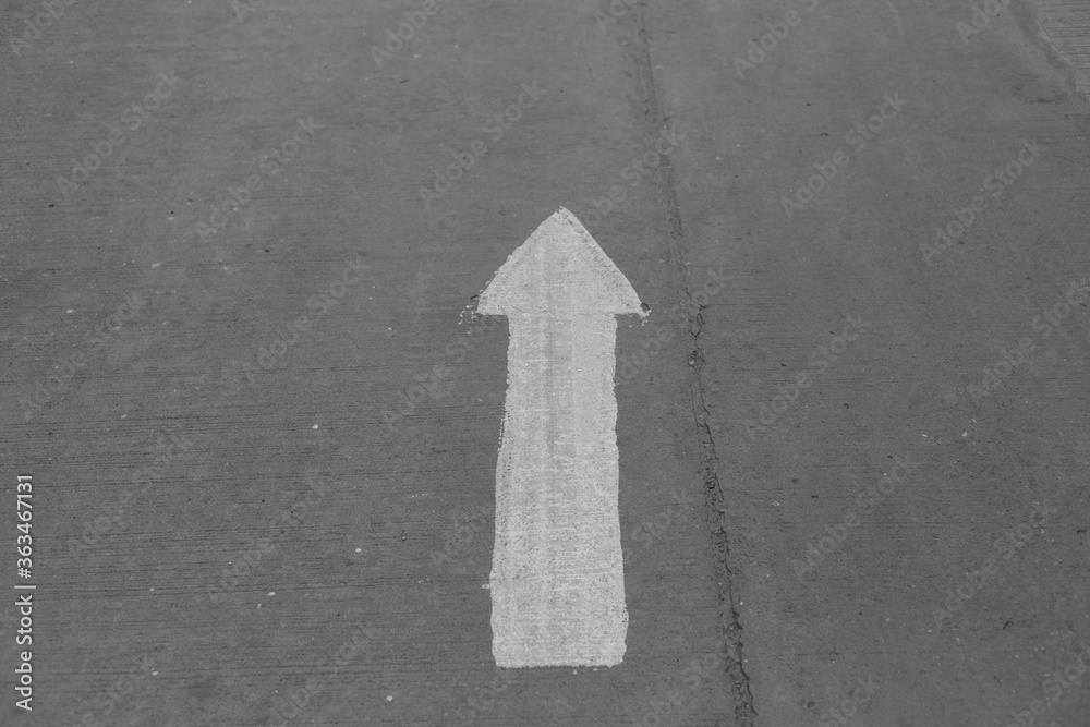 Fototapeta premium Road marking arrow on asphalt