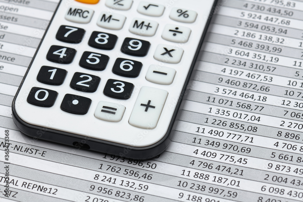 business office desk closeup - financial reports, analysis and accounting, set of documents, tables and graphs, various items for bookkeeping, calculator business office desk closeup - financial reports, analysis and accounting, set of documents, tables and graphs, various items for bookkeeping, calculator