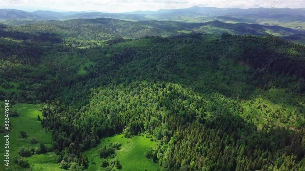 Aerial view of mountains and forests filmed on a drone. Carpathian .Lush beautiful green valleys. 4K UHD drone footage. Aerial view of mountains and forests filmed on a drone. Carpathian .Lush beautiful green valleys. 4K UHD drone footage.
