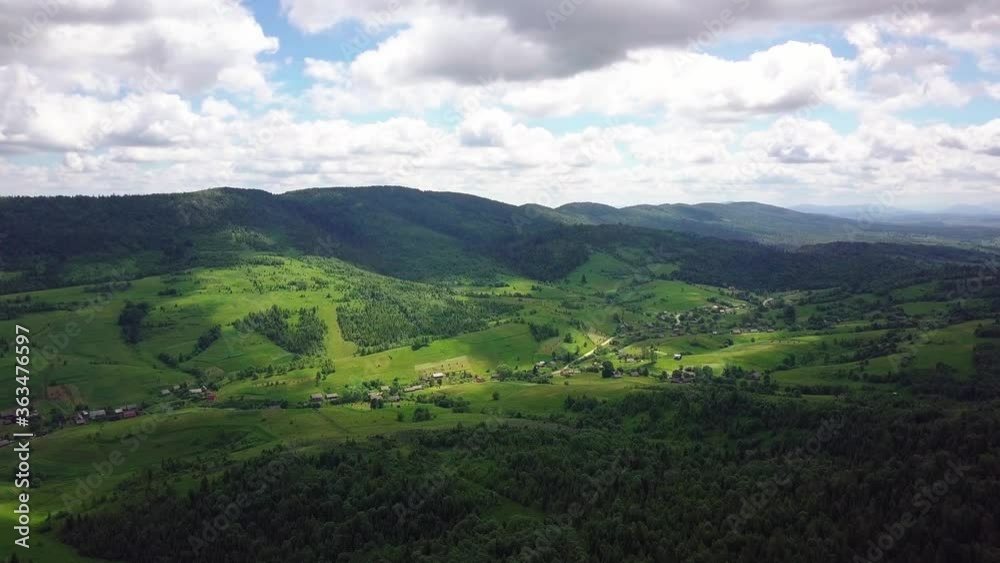 Aerial view of mountains and forests filmed on a drone. Carpathian .Lush beautiful green valleys. 4K UHD drone footage. Aerial view of mountains and forests filmed on a drone. Carpathian .Lush beautiful green valleys. 4K UHD drone footage.