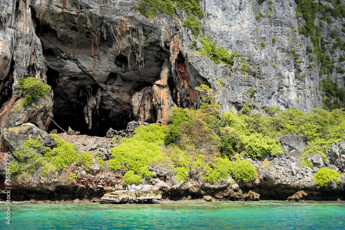 Eroded overgrown limestone rocks in Phang Nga Bay, Ao Phang Nga Marine National Park, Thailand,