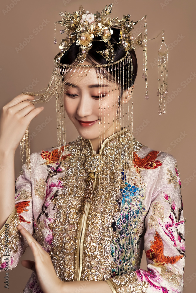 Asian woman wearing a crown
