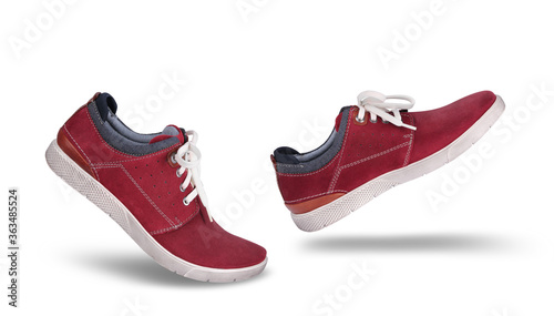 Stylish trendy red suede shoes walking forward