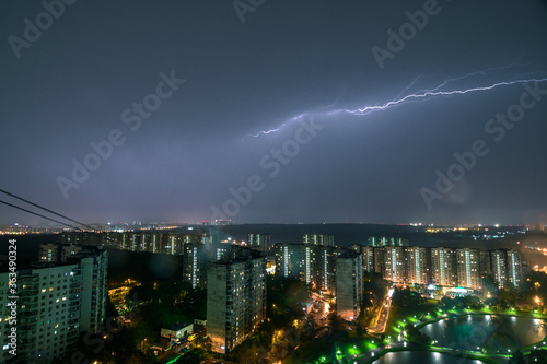 Lightning in sky over night Moscow