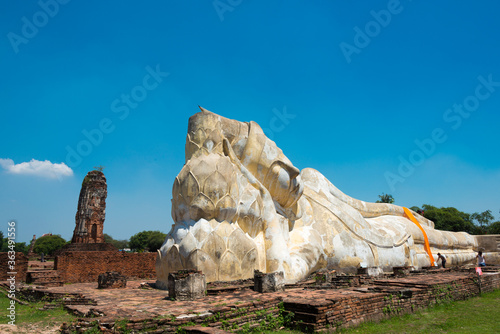 Nirvana statue at WAT LOKAYA SUTHA in Ayutthaya, Thailand. It is part of the World Heritage Site - Historic City of Ayutthaya. photo