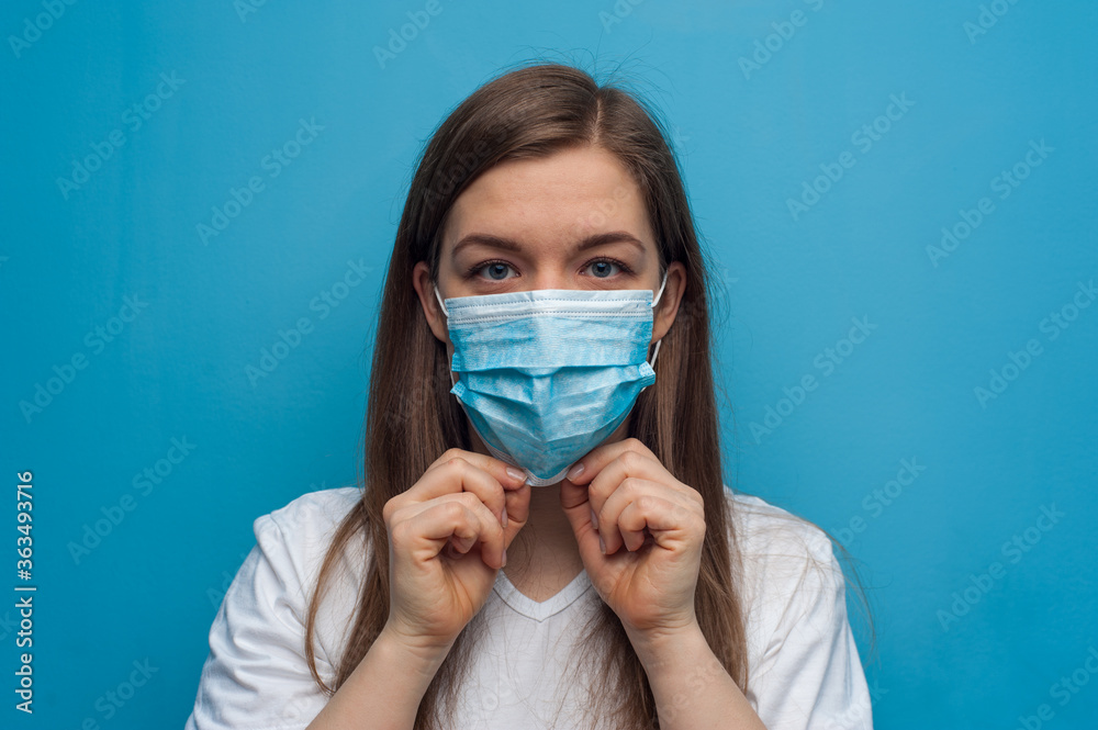 Woman wearing an anti virus protection mask to prevent corona virus Woman wearing an anti virus protection mask to prevent corona virus