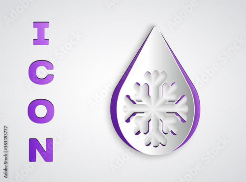 Paper cut Defrosting icon isolated on grey background. From ice to water symbol. Paper art style. Vector Illustration.