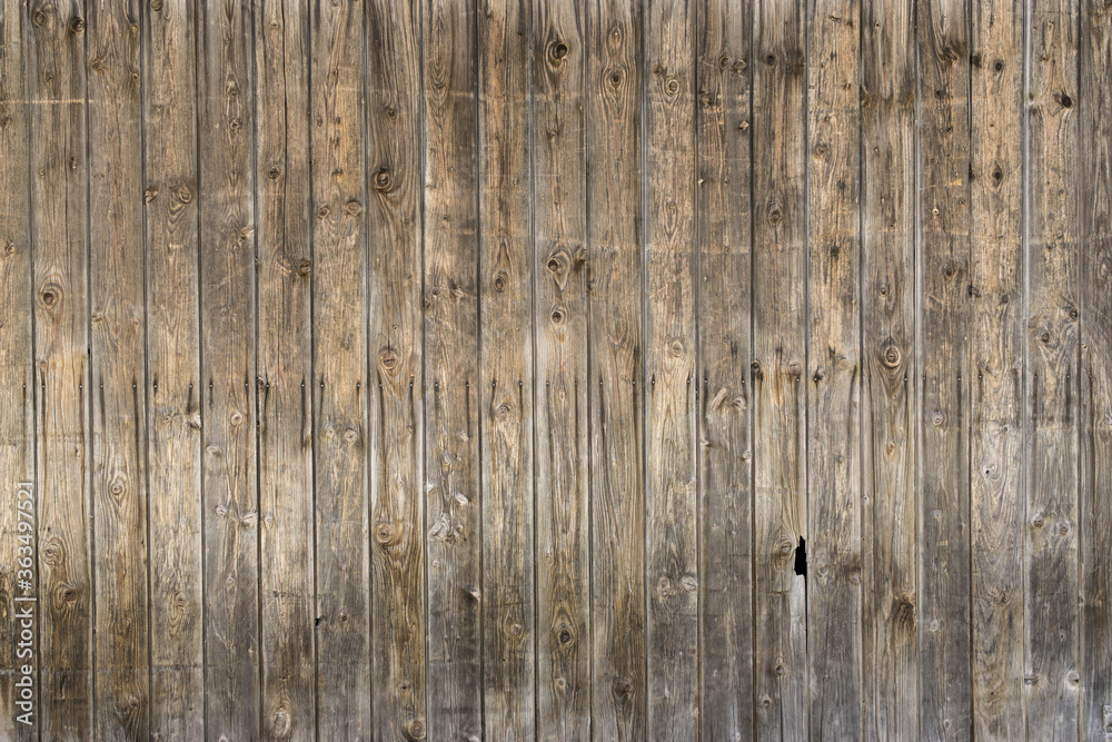 Natural brown barn wood wall. Wall texture background pattern. Natural brown barn wood wall. Wall texture background pattern.