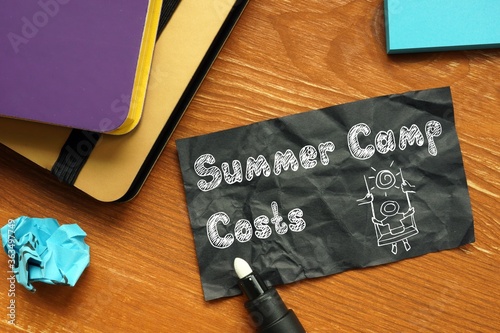 Financial concept meaning Summer Camp Costs with phrase on the sheet.